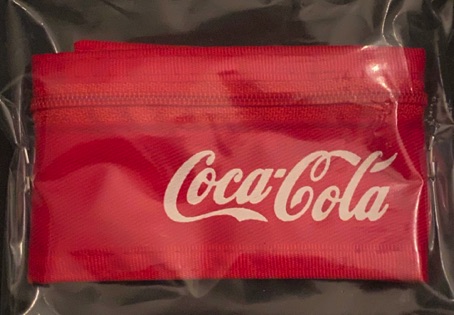 95105-1 € 2,00 coca cola polsbandje tevens portemennee.jpeg